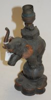 Lot 63 - A 20th century copper table lamp in the form...
