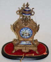 Lot 165 - A late 19th century French gilt metal mantel...