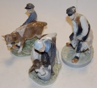 Lot 252 - A Royal Copenhagen figure group of a young boy...