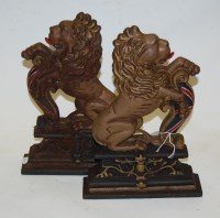 Lot 114 - A pair of reproduction cast iron doorstops...
