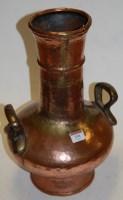 Lot 191 - An early 20th century hammered copper twin...
