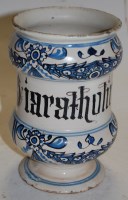 Lot 270 - A 19th century Dutch Delft blue and white drug...