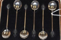 Lot 299 - A cased set of six George V silver coffee bean...