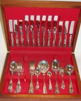 Lot 311 - A modern mahogany cased canteen of silver...