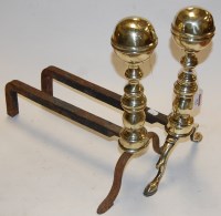 Lot 324 - A pair of late 19th century turned brass andirons