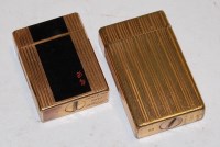 Lot 333 - A DuPont of Paris gilt brass pocket cigarette...