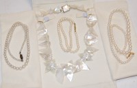 Lot 338 - A cultured pearl single string necklace, two...