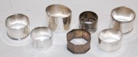 Lot 342 - Seven various silver napkin rings to include...