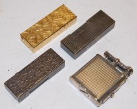 Lot 348 - Four various Dunhill pocket cigarette lighters...