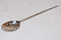 Lot 355 - A silver mote spoon with typical pierced bowl,...