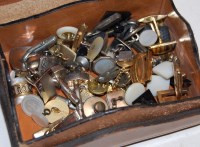 Lot 373 - A gilt tooled leather trinket box and contents,...