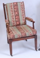 Lot 1501 - A Victorian walnut bobbin turned open armchair,...