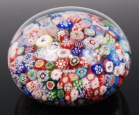 Lot 1110 - A Baccarat millefiori glass paperweight, the...