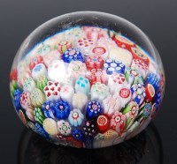 Lot 1111 - A small Baccarat millefiori glass paperweight,...