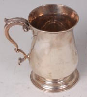 Lot 1124 - An early George III silver bell shaped tankard,...