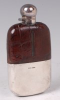 Lot 1125 - An Edwardian glass and silver hip flask,...