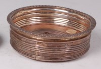 Lot 1127 - A late Georgian silver coaster, having an egg...