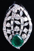 Lot 1148 - A contemporary 14ct white gold, emerald and...