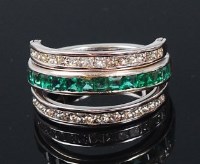 Lot 1157 - A contemporary 14ct white gold, ruby, emerald...