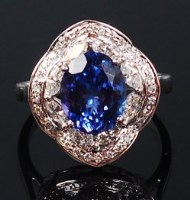 Lot 1159 - A contemporary 14ct white gold, tanzanite and...