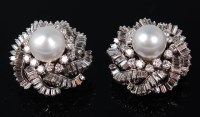 Lot 1162 - A pair of cultured pearl and diamond earrings...