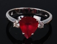 Lot 1166 - An 18ct white gold, ruby and diamond ring,...