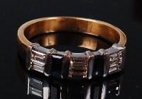 Lot 1167 - A contemporary 18ct gold, sapphire and diamond...