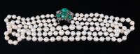 Lot 1179 - A triple string cultured pearl choker, having...