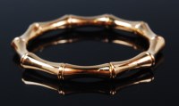 Lot 1180 - A ladies 18ct gold Gucci faux bamboo sprung...