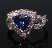 Lot 1182 - A contemporary 14ct white gold, tanzanite and...