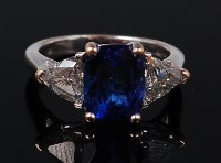 Lot 1184 - An 18ct white gold, tanzanite and diamond ring,...