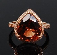 Lot 1202 - A contemporary 14ct gold and champagne topaz...