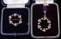 Lot 1221 - An Edwardian 9ct gold and seed pearl openwork...