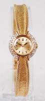 Lot 1226 - A ladies Corum 18ct gold diamond set cocktail...
