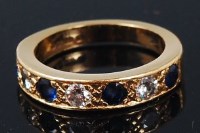 Lot 1234 - An 18ct gold, sapphire and diamond set half...