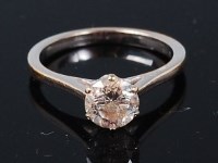 Lot 1235 - A white metal diamond solitaire ring, the claw...