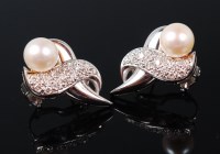 Lot 1243 - A pair of Garrard & Co 18ct white gold,...