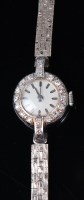 Lot 1246 - A ladies platinum and diamond set cocktail...