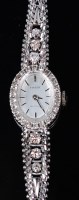 Lot 1247 - A ladies Tissot Saphir 18ct white gold and...