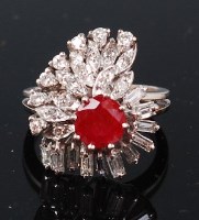 Lot 1251 - A modern white metal, ruby and diamond set...