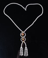 Lot 1268 - A fine 18ct white gold and diamond necklace,...