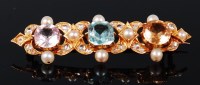 Lot 1270 - An 18ct gold multi-stone set bar brooch,...