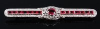 Lot 1272 - An Art Deco white metal, ruby and diamond set...