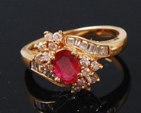 Lot 1273 - A contemporary 18ct gold, ruby and diamond...