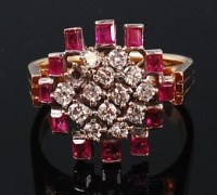 Lot 1275 - An 18ct gold, ruby and diamond set cocktail...