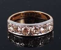 Lot 1285 - A yellow metal diamond half eternity ring, the...