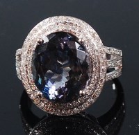 Lot 1295 - A contemporary 14ct white gold, tanzanite and...