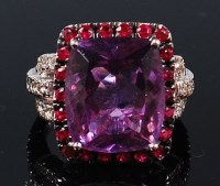 Lot 1297 - An 18ct white gold precious set dress ring,...