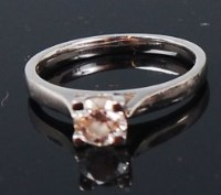 Lot 1304 - A contemporary platinum diamond solitaire ring,...
