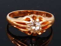 Lot 1308 - An 18ct gold diamond solitaire ring, the claw...